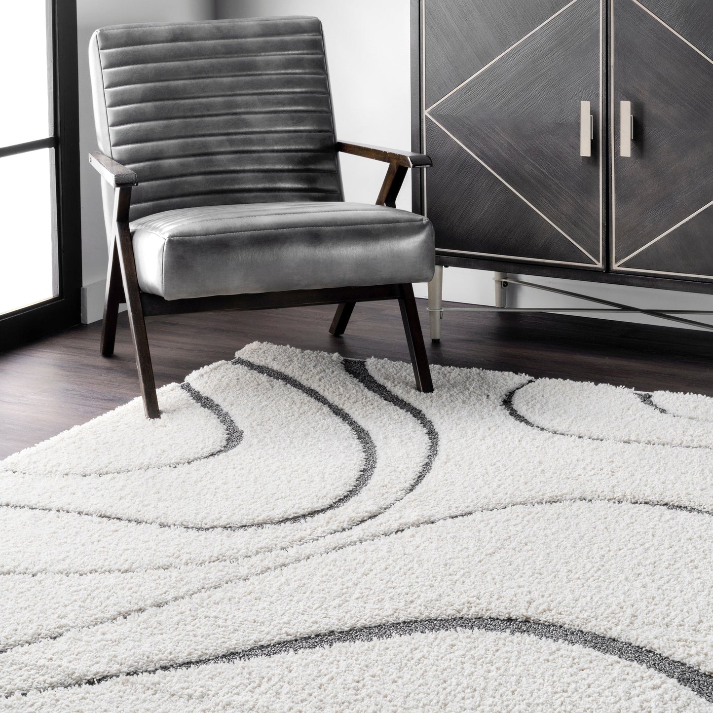 Tapis Shag contemporain Nuloom Krista à motifs tourbillonnants
