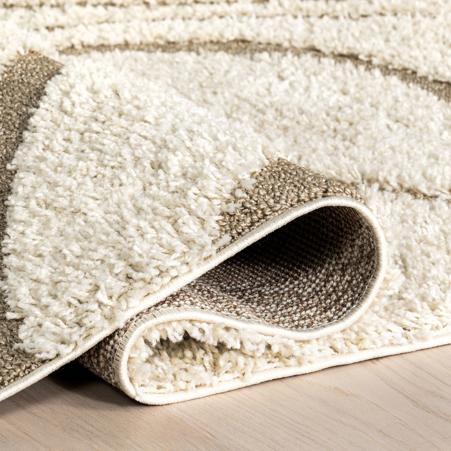 Tapis Shag contemporain Nuloom Krista à motifs tourbillonnants