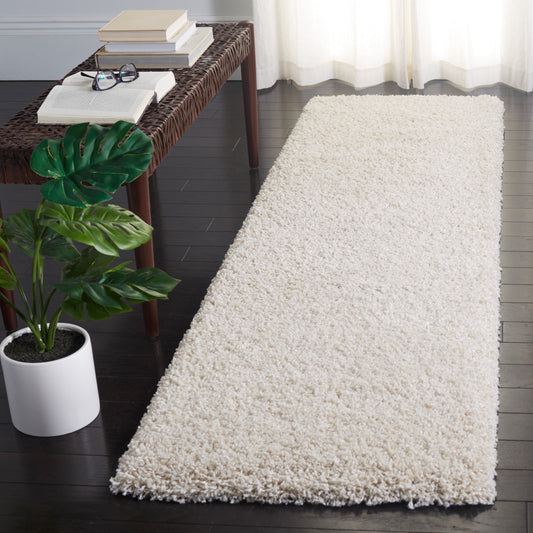 Tapis SAFAVIEH Evolution Shag Fransien Solid 1,8 pouce d'épaisseur