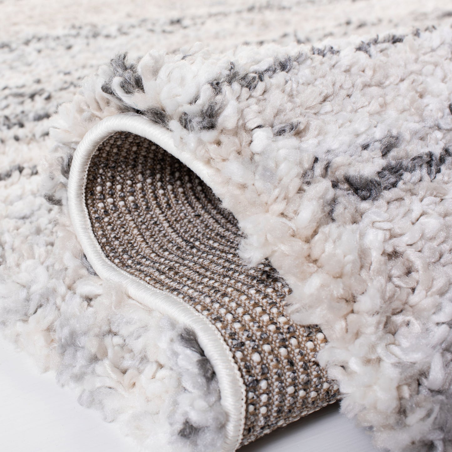 Tapis moderne à rayures SAFAVIEH Fontana Shag Mevlide de 2 pouces d'épaisseur