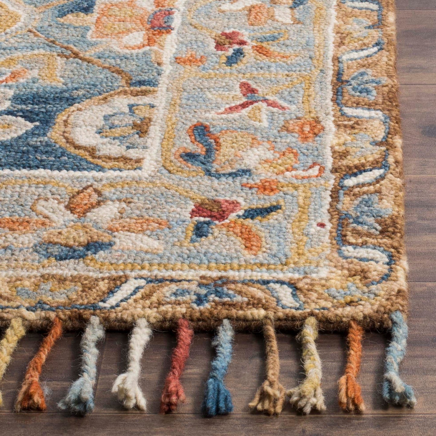 Tapis en laine à pompons Boho Aspen Kimm fait main SAFAVIEH