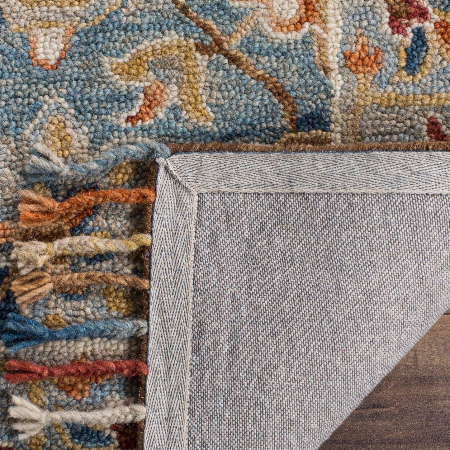 Tapis en laine à pompons Boho Aspen Kimm fait main SAFAVIEH