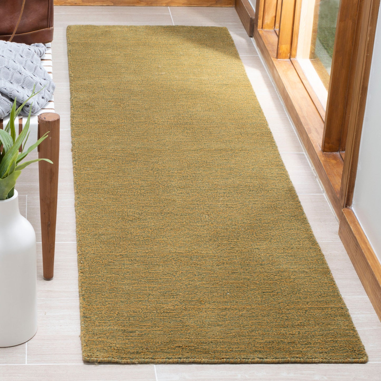 Tapis moderne en laine fait main SAFAVIEH avec bordure en palmier de l'Himalaya