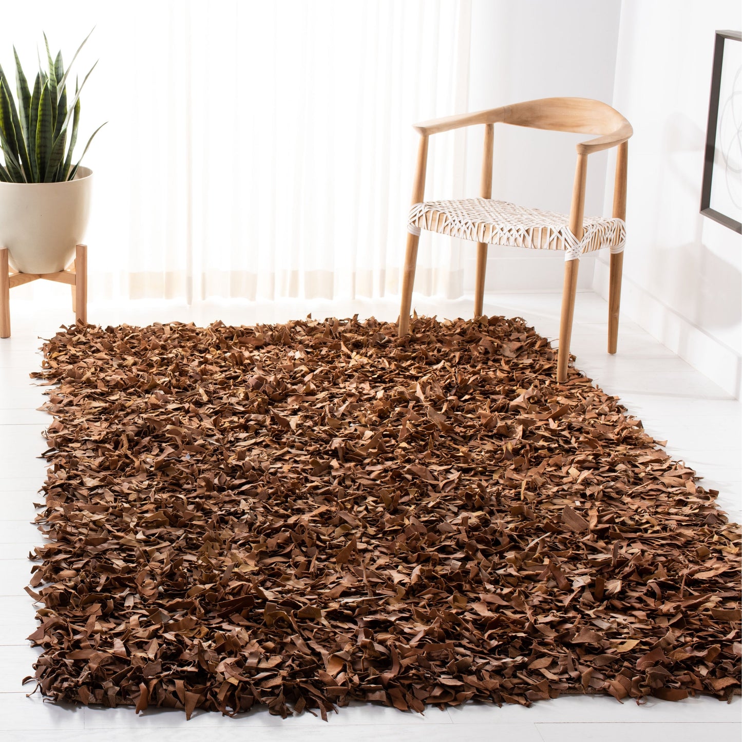 Tapis décoratif moderne en cuir fait main SAFAVIEH Shag Doinita