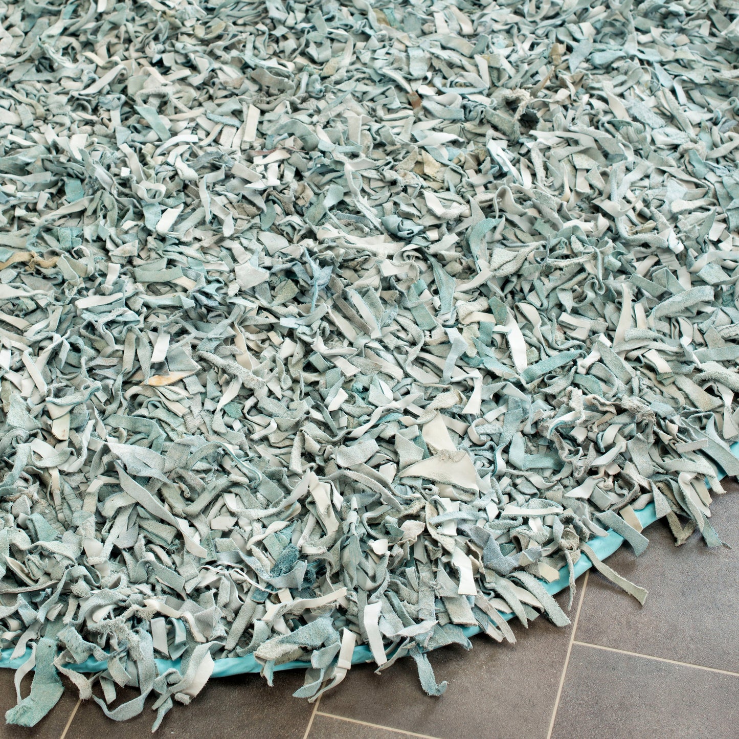 Tapis décoratif moderne en cuir fait main SAFAVIEH Shag Doinita