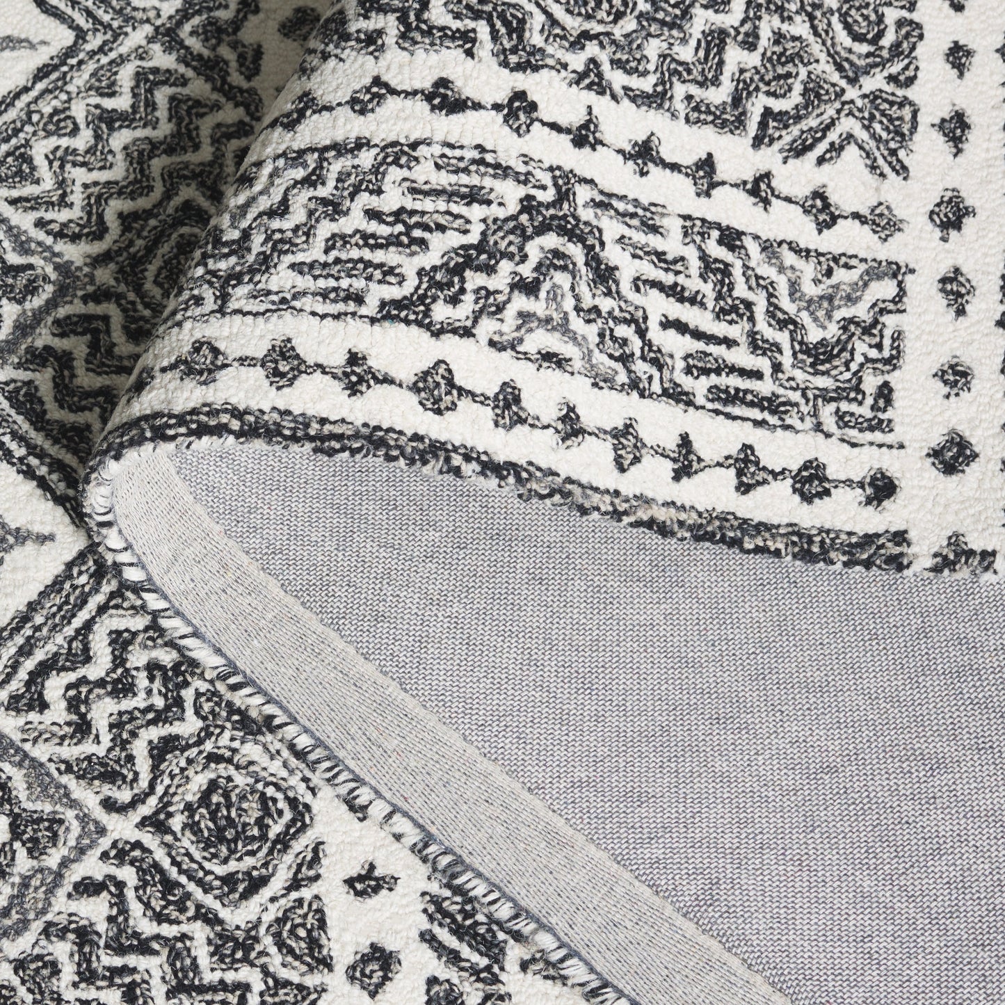 Tapis en laine Lutetia micro-bouclé fait main SAFAVIEH