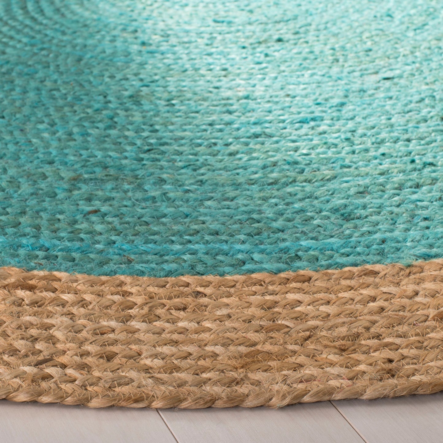 Tapis rond en jute fait main en fibres naturelles Jolette avec bordure SAFAVIEH
