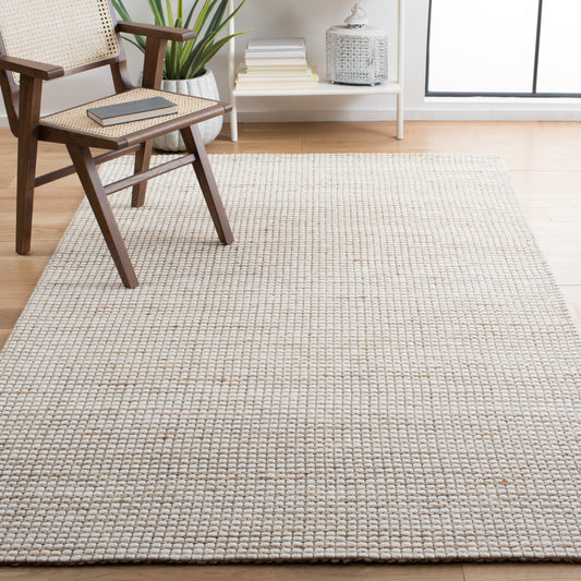 Tapis SAFAVIEH fait main en fibre naturelle Yareli jute et laine.