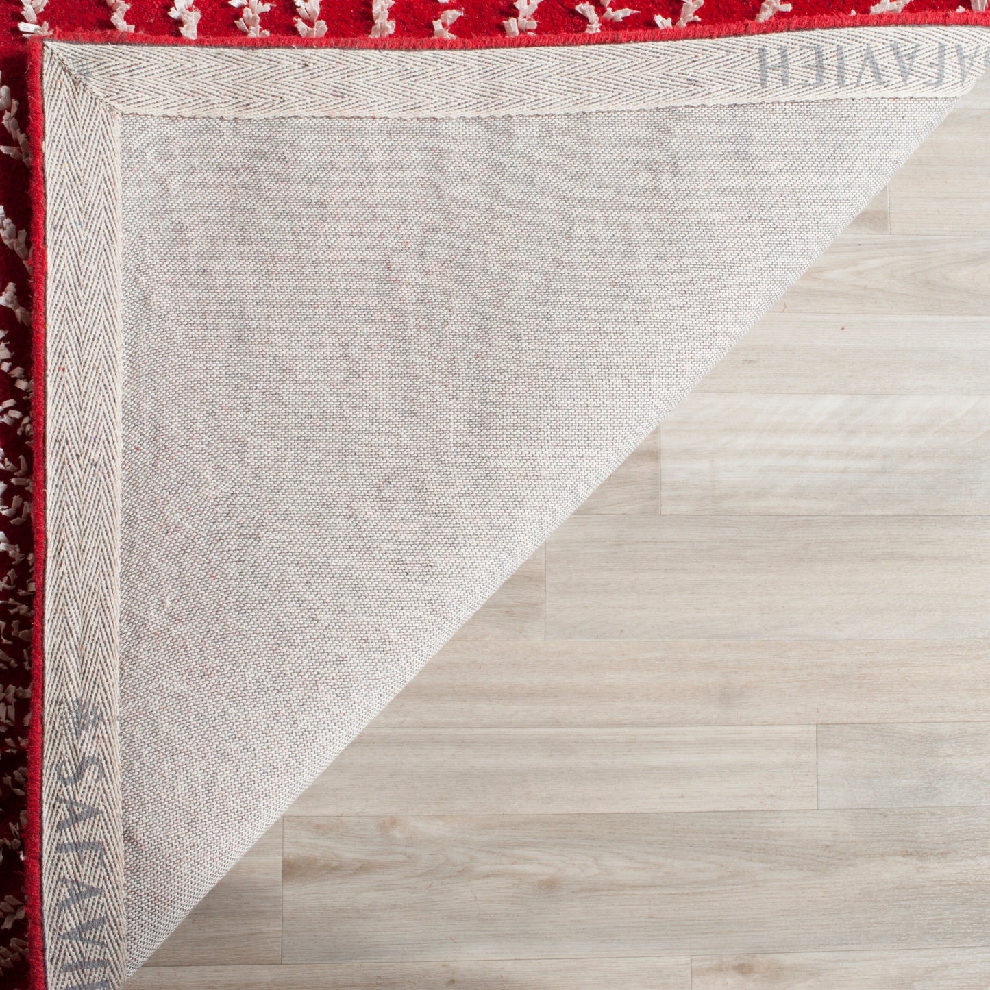 Tapis en laine de Nouvelle-Zélande fait main SAFAVIEH Soho Sade