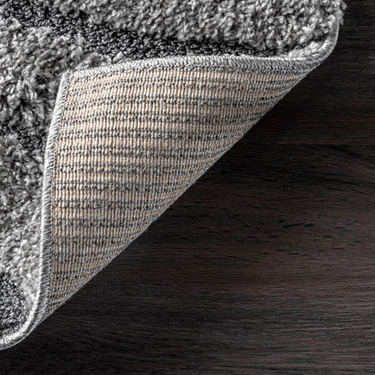 Tapis Shag contemporain Nuloom Krista à motifs tourbillonnants