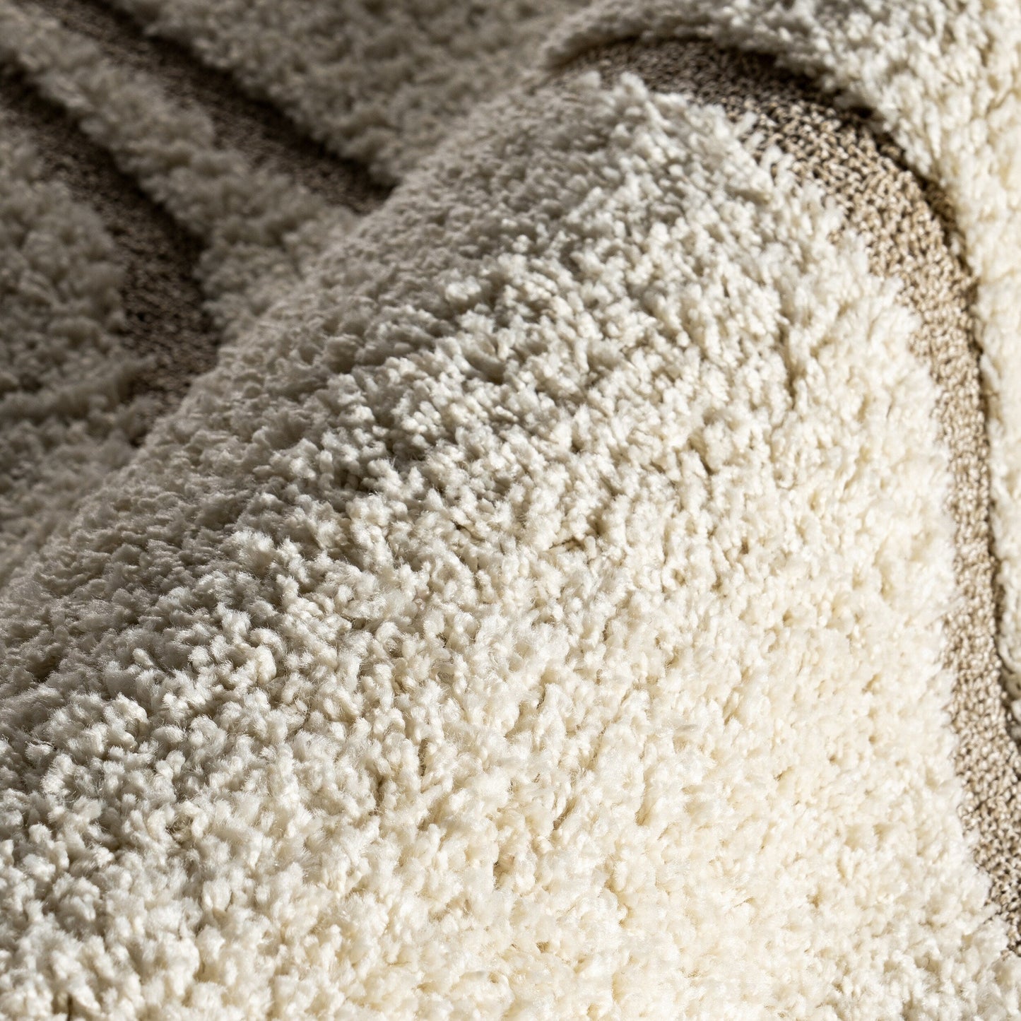 Tapis Shag contemporain Nuloom Krista à motifs tourbillonnants