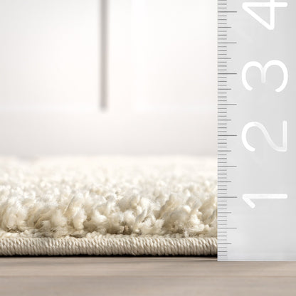 Tapis Shag contemporain Nuloom Krista à motifs tourbillonnants