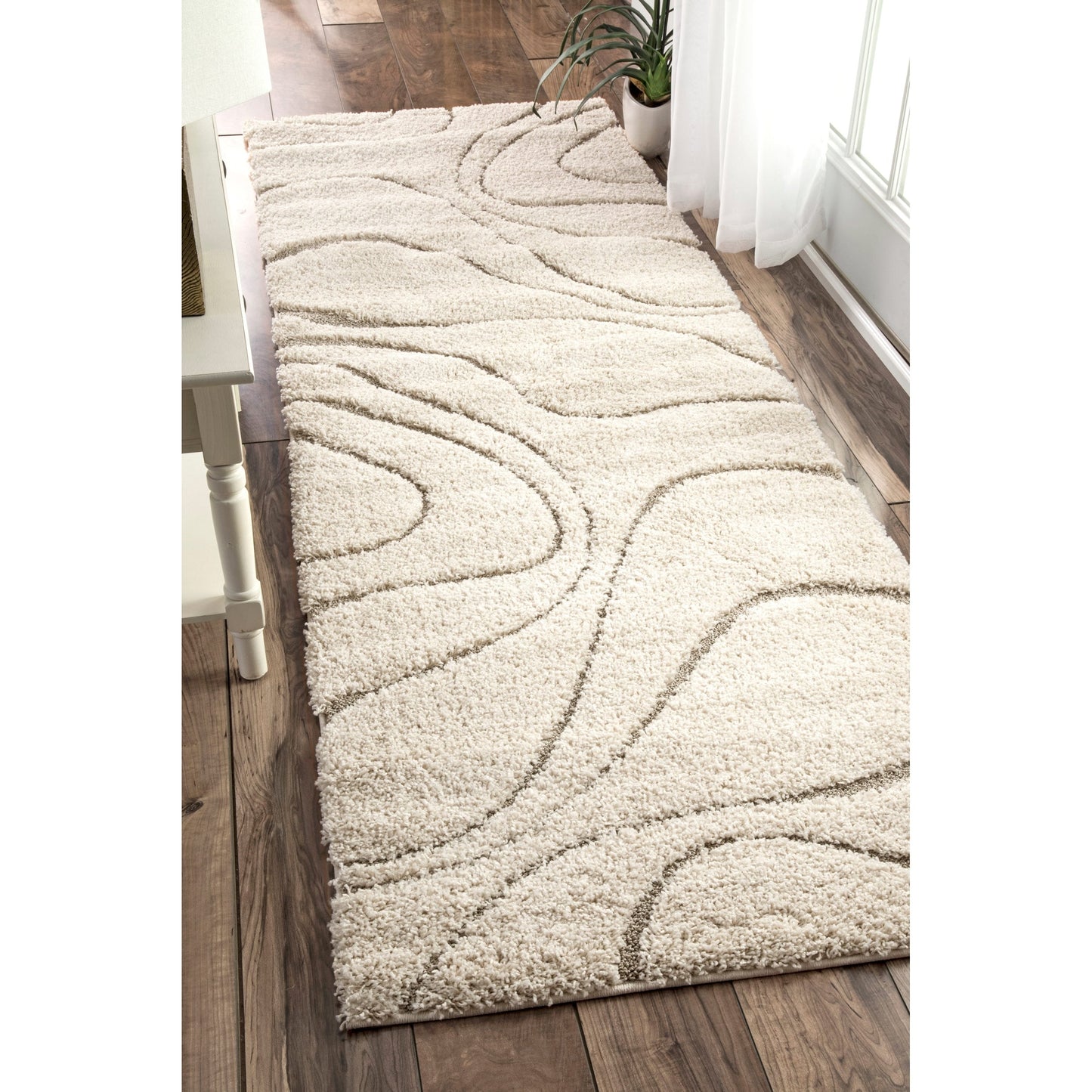 Tapis Shag contemporain Nuloom Krista à motifs tourbillonnants