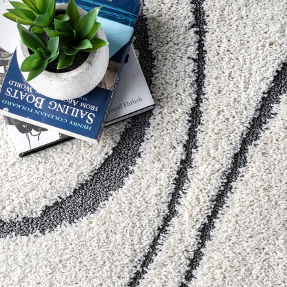 Tapis Shag contemporain Nuloom Krista à motifs tourbillonnants