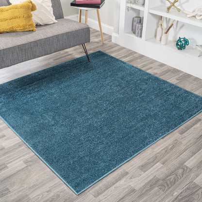 JONATHAN Y Tumbling Solid Low-Pile Area Rug