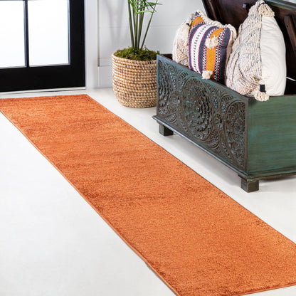 JONATHAN Y Tumbling Solid Low-Pile Area Rug