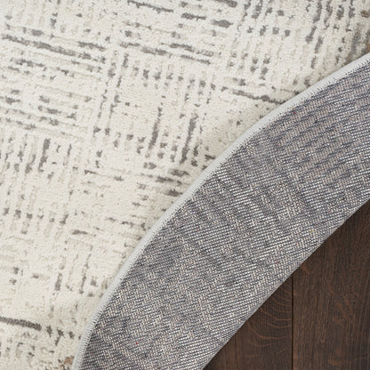 Tapis abstrait gris ivoire Nourison Emily pour l'intérieur uniquement