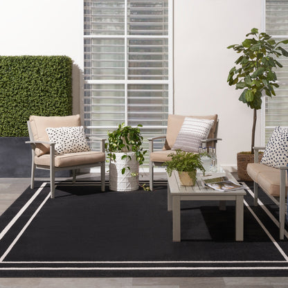 Nourison Essentials Indoor/Outdoor Solid Area Rug