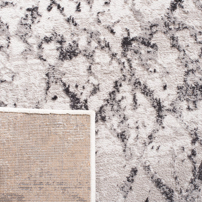 SAFAVIEH Amelia Selvete Tapis moderne en treillis vieilli