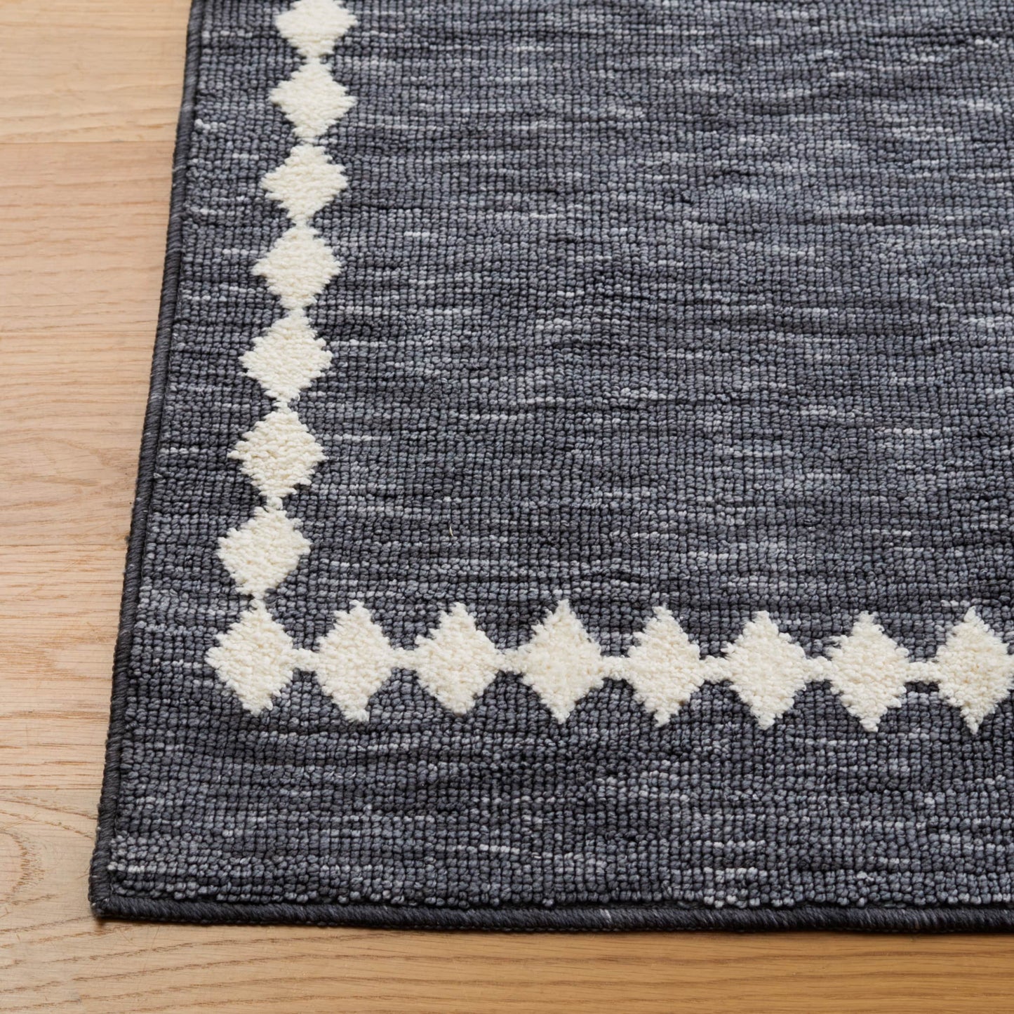 Tapis SAFAVIEH à bordure Lintrud, facile d'entretien et lavable en machine