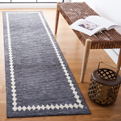 Tapis SAFAVIEH à bordure Lintrud, facile d'entretien et lavable en machine