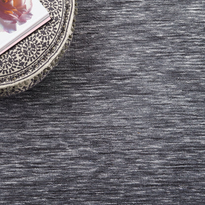 Tapis SAFAVIEH à bordure Lintrud, facile d'entretien et lavable en machine