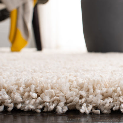 Tapis SAFAVIEH Evolution Shag Fransien Solid 1,8 pouce d'épaisseur