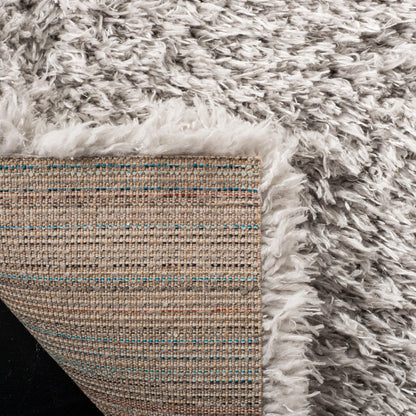 Tapis SAFAVIEH Flokati Shag Wynne de 2,75 pouces d'épaisseur