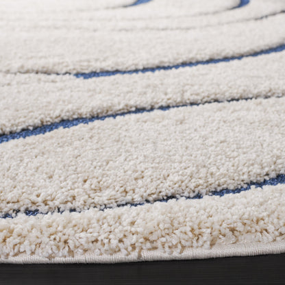 Tapis SAFAVIEH Florida Shag Staka à motifs de vagues abstraites de 3 cm