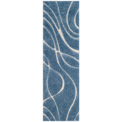 Tapis SAFAVIEH Florida Shag Staka à motifs de vagues abstraites de 3 cm