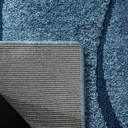 Tapis SAFAVIEH Florida Shag Staka à motifs de vagues abstraites de 3 cm