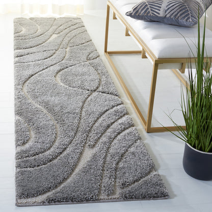 Tapis SAFAVIEH Florida Shag Staka à motifs de vagues abstraites de 3 cm