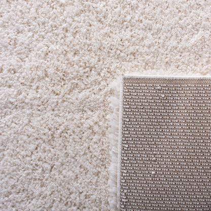 Tapis SAFAVIEH Fontana Shag Dagi solide de 2 pouces d'épaisseur