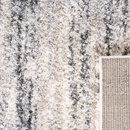 Tapis moderne à rayures SAFAVIEH Fontana Shag Mevlide de 2 pouces d'épaisseur