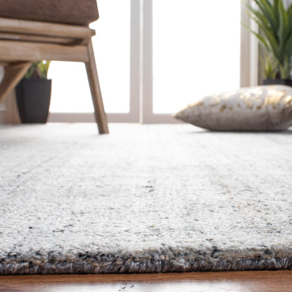 Tapis moderne en viscose corail abstrait fait main SAFAVIEH