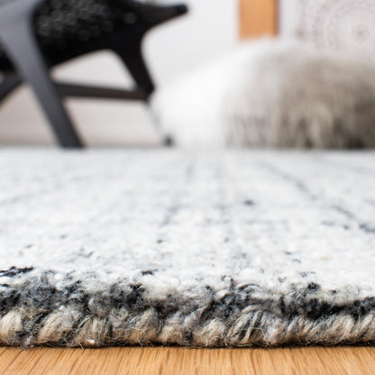 Tapis moderne en viscose corail abstrait fait main SAFAVIEH