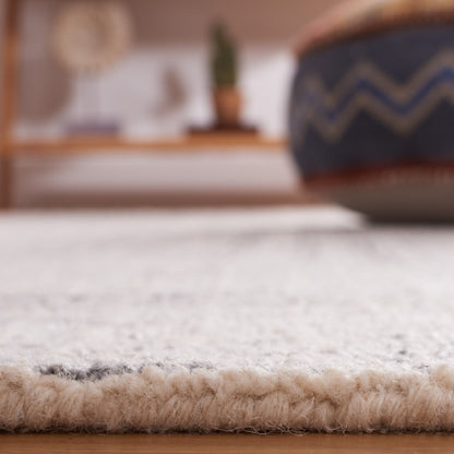 Tapis en laine moderne abstrait fait main SAFAVIEH Maggy