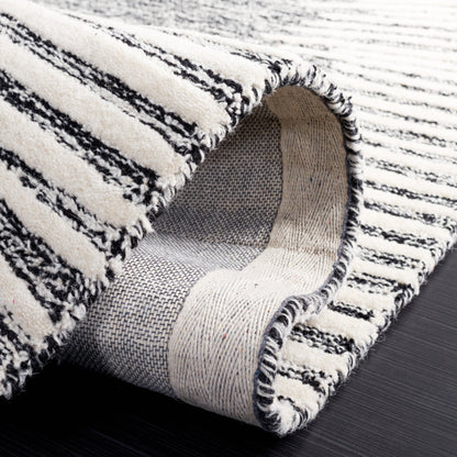 Tapis moderne en laine Sofoula abstrait fait main SAFAVIEH