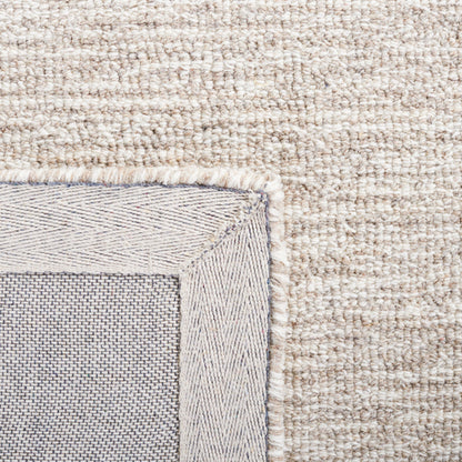 Tapis moderne en laine Sofoula abstrait fait main SAFAVIEH