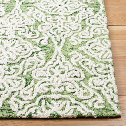 Tapis moderne en laine florale SAFAVIEH fait main Blossom Cateluta