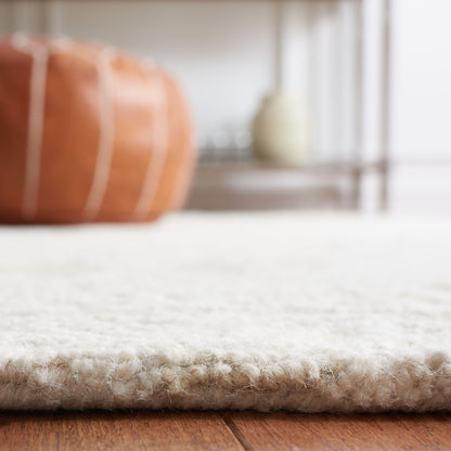 Tapis moderne en laine florale SAFAVIEH fait main Blossom Cateluta