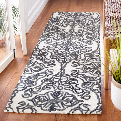 Tapis moderne en laine florale SAFAVIEH fait main Blossom Cateluta