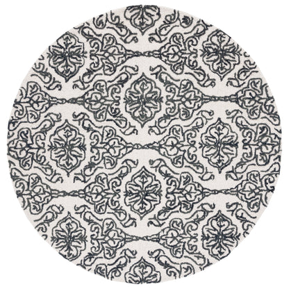 Tapis moderne en laine florale SAFAVIEH fait main Blossom Cateluta