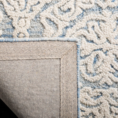 Tapis moderne en laine florale SAFAVIEH fait main Blossom Cateluta