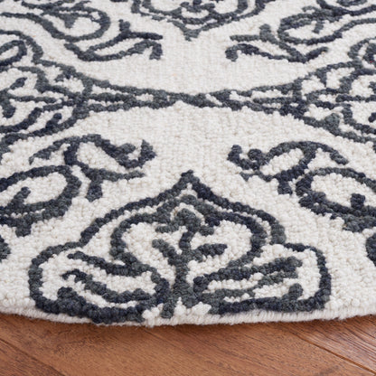 Tapis moderne en laine florale SAFAVIEH fait main Blossom Cateluta