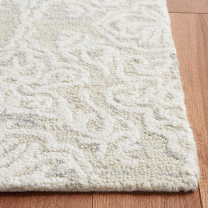 Tapis moderne en laine florale SAFAVIEH fait main Blossom Cateluta