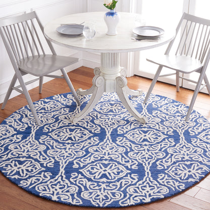 Tapis moderne en laine florale SAFAVIEH fait main Blossom Cateluta