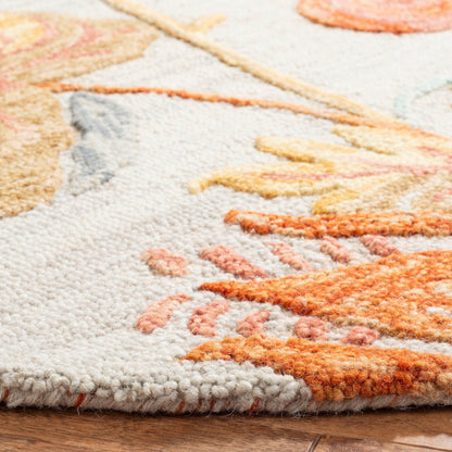 Tapis en laine floral moderne SAFAVIEH fait main Blossom Hysnije
