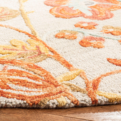 Tapis en laine floral moderne SAFAVIEH fait main Blossom Hysnije
