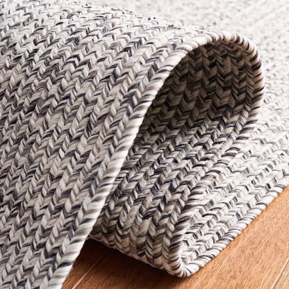 Tapis décontracté tressé fait main SAFAVIEH Anthi